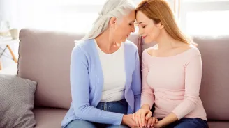Mother and Daughter Comforting Each Other