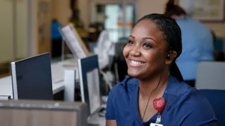 An AdventHealth Nurse smiling