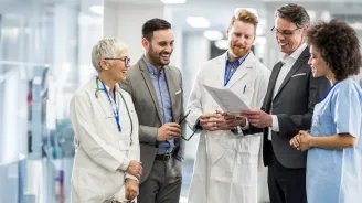 Pharmacists and care team collaborating