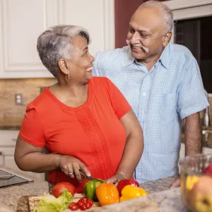 Couple cooking heart healthy meal