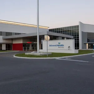 Exterior of AdventHealth Wauchula at dusk.