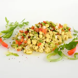 scrambled tofu mixed with bell peppers and onions