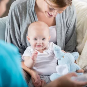 Mother holding her baby