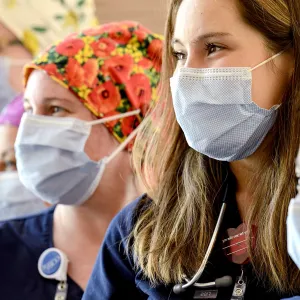 A group of nurses wearing face masks.