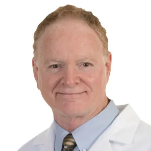 A professional headshot of Dr. John Bollinger