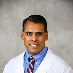 Professional headshot of Dr. Sanjay Pattani