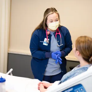 AdventHealth Murray nurse with patient