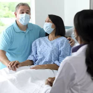 A couple in a hospital room at AdventHealth.