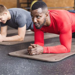 A group exercise class builds core strength.