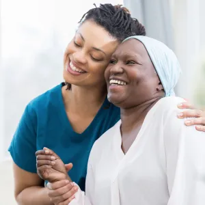 Smiling female patient with nurse