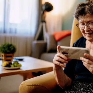 An older woman using video chat. 