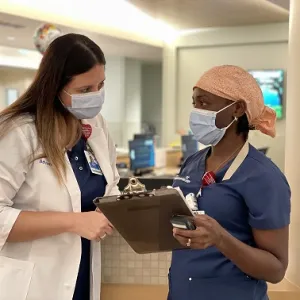 Shezel O’Neal  and AdventHealth Celebration team member