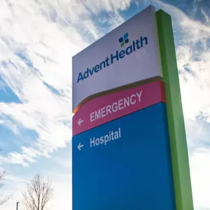 AdventHealth exterior hospital signage. 