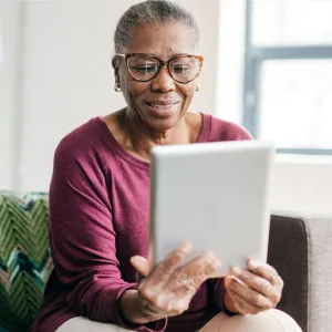 Woman reading tablet