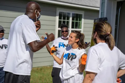 Magic Volunteer Program at a Habitat for Humanity event.