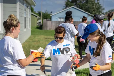 Magic Volunteer Program volunteers at a Habitat for Humanity Event.