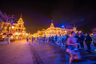 Runners running runDisney Princess Half Marathon at the Magic Kingdom.