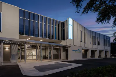 AdventHealth New Tampa Care Pavilion at night.
