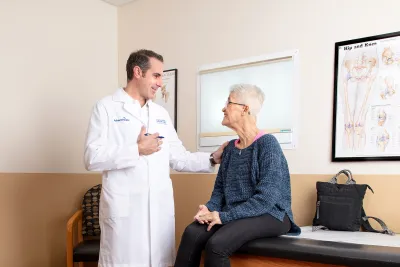 Doctor speaking with patient
