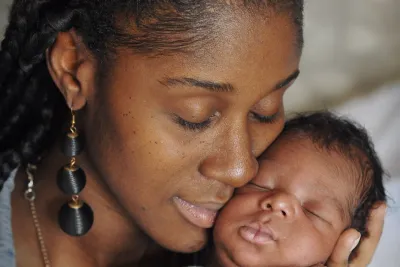 Woman holding her baby