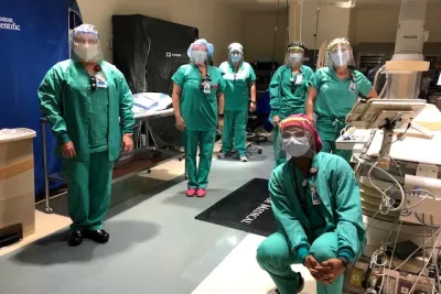 Physicians wearing face shields