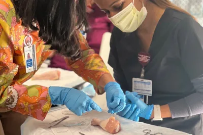 Family Medicine Residency team members doing surgery exercise