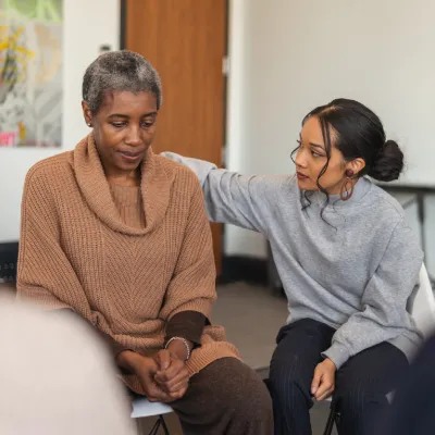 Two women at a support group