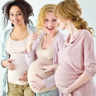 Three women chatting after a Dancing for Birth class.