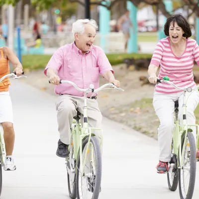 Three People Riding a Bike