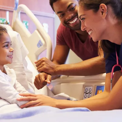 Little girl in hospital bed