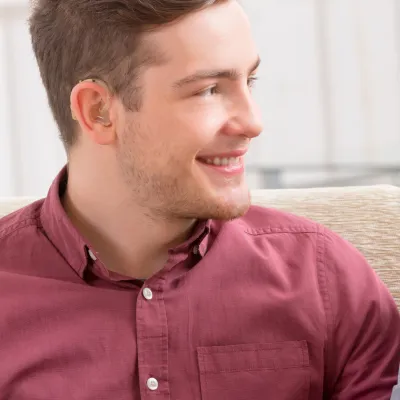Young man with hearing aid