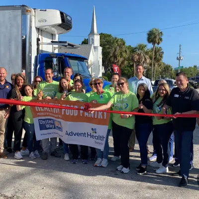 Leaders and volunteers from AdventHealth, United Way of Central Florida, Hands for the Homeless and the community worked together to distribute more than 9400 pounds of food to people in need