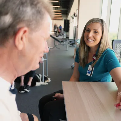 AdventHealth neuro-occupational therapist working with a Vivistim patient.