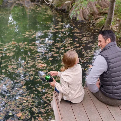 Father took his daughter fishing.