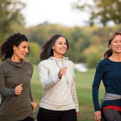 Three friends going for a walk in the park.