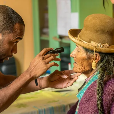 Physician checking patient's health.