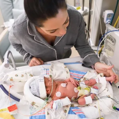 Sondra with Leo in the AdventHealth NICU.
