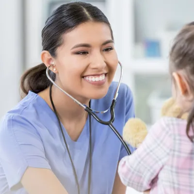 Doctor seeing a pediatric patient. 