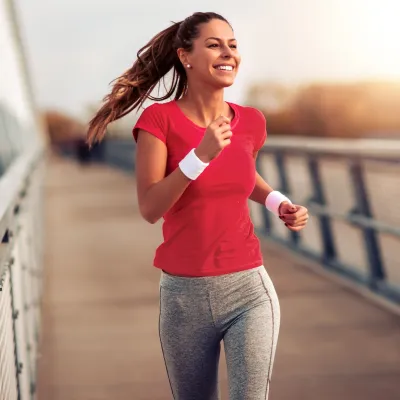 A woman running outdoors.