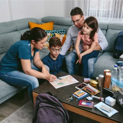 Family preparing wild fire evacuation plan.
