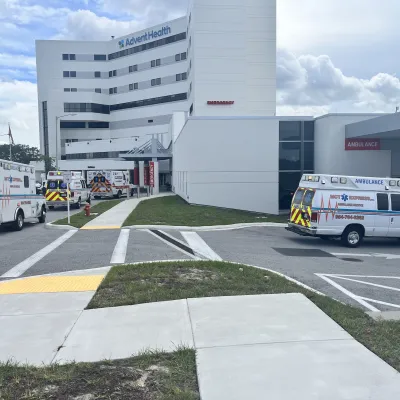 AdventHealth North Pinellas hospital with ambulances 