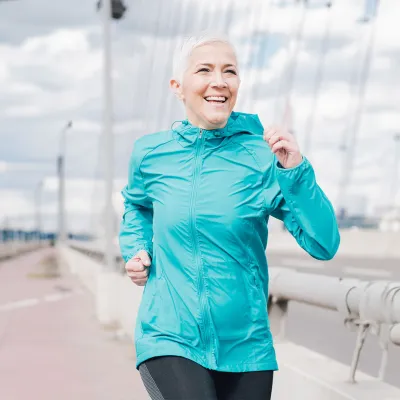 woman-jogging-and-smiling