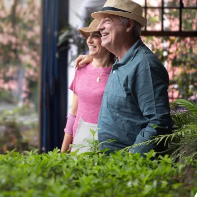 Senior couple walking outdoors.
