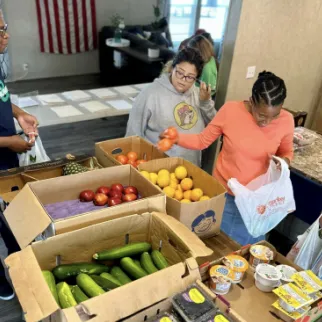 Team members volunteer at Mobile Market 2 Go