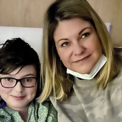 Mary Albers with her son, Dylan, while he was in the hospital during the transplant process