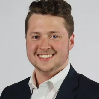 Headshot of Mathew Howland.