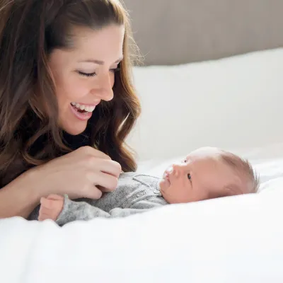 Mother and baby at home.