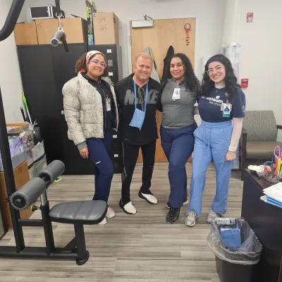 James Harshbarger credits the Cardiac rehab team at AdventHealth Heart of Florida for helping him in his recovery following a third heart attack. Photo of James with three members of cardiac rehab team. (From L-R) Joyness Rodriguez, James Harshbarger, Janel Santana, Paige Gilchrist (photo courtesy: James Harshbarger)
