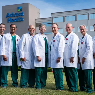 AdventHealth Medical Group Cardiology at Rome stand in front of AdventHealth Redmond