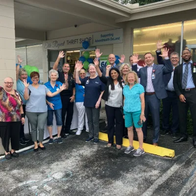 Volunteers and AdventHealth team members gather for 60 year celebration of Elite Repeat